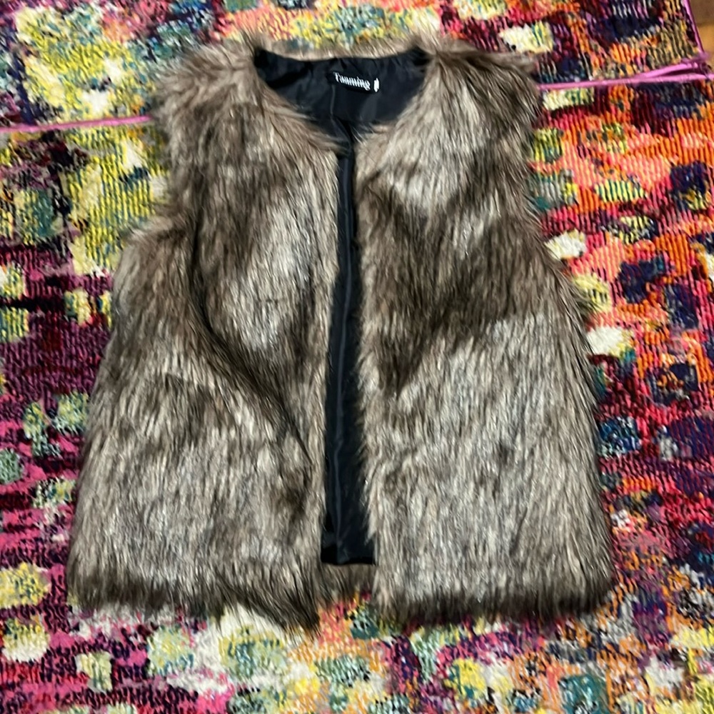 Faux fur vest size medium.